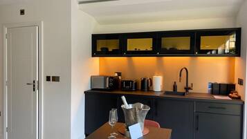 Fridge, electric kettle, toaster, cookware/dishes/utensils