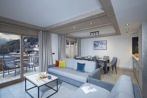 Appartement 4 pièces 8 personnes Prestige | Living area | 61-inch flat-screen TV with satellite channels - MGM Hôtels & Résidences – Résidence Le Hameau de l’Ours (Manigod)
