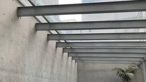 A swimming pool with a glass ceiling, concrete walls, and a potted plant. - In Polanco, pool, rooftop, gym, 24/7 security (Ciudad de México)