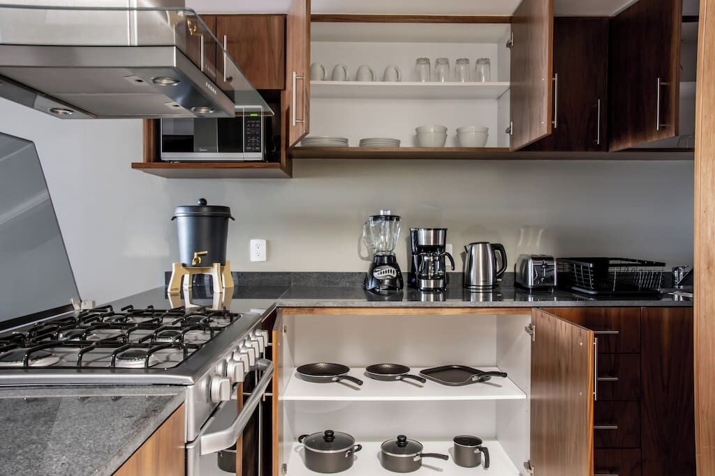 Coffee/tea maker, fridge, microwave, oven
