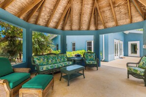 Terrace/patio - Pease Bay Manor is a private, secluded beachfront villa - call Cayman Villas (Bodden Town)
