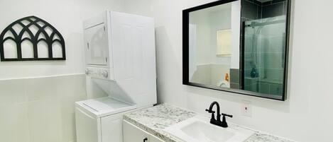 Hair dryer, towels, soap, toilet paper