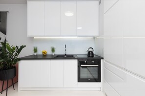 Apartemen, 1 kamar tidur, balkon | Dapur pribadi | Oven, mesin pencuci piring, dan ketel listrik