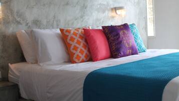 Premium bedding, pillow-top beds, minibar, individually decorated
