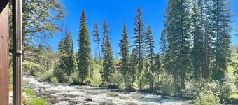 Riverfront retreat with a full kitchen, kitchenette, fireplace, & washer/dryer