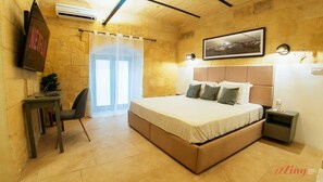1 habitación, tabla de planchar con plancha, cuna de viaje y wifi