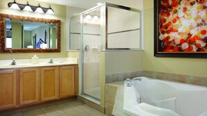 Jetted tub, hair dryer, towels, soap
