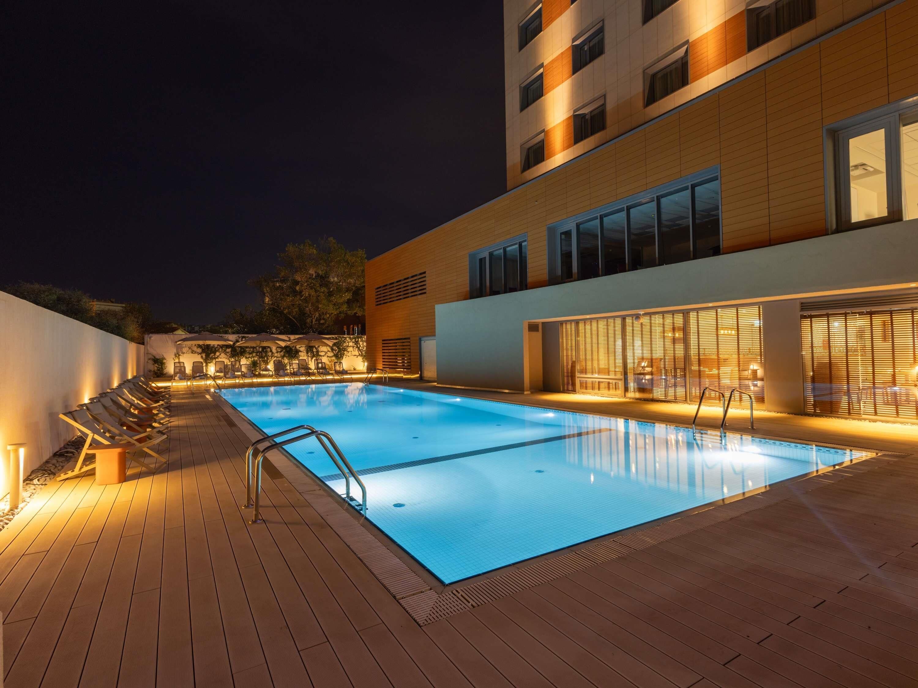 Outdoor pool, open 10:00 AM to 7:00 PM, pool umbrellas, sun loungers