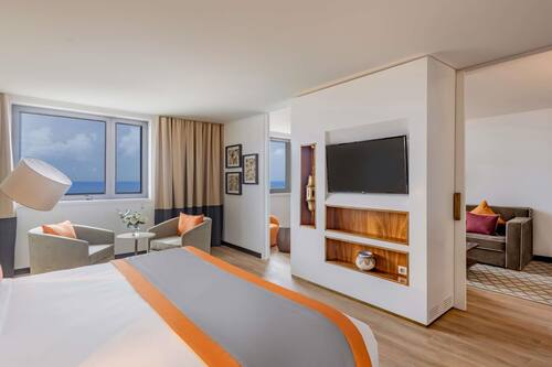 Suite Junior, 1 très grand lit et 1 canapé-lit, vue sur l’océan | Literie de qualité, minibar, coffre-fort pour ordinateur portable