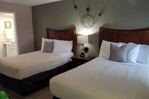 1 bedroom, desk, iron/ironing board, travel crib