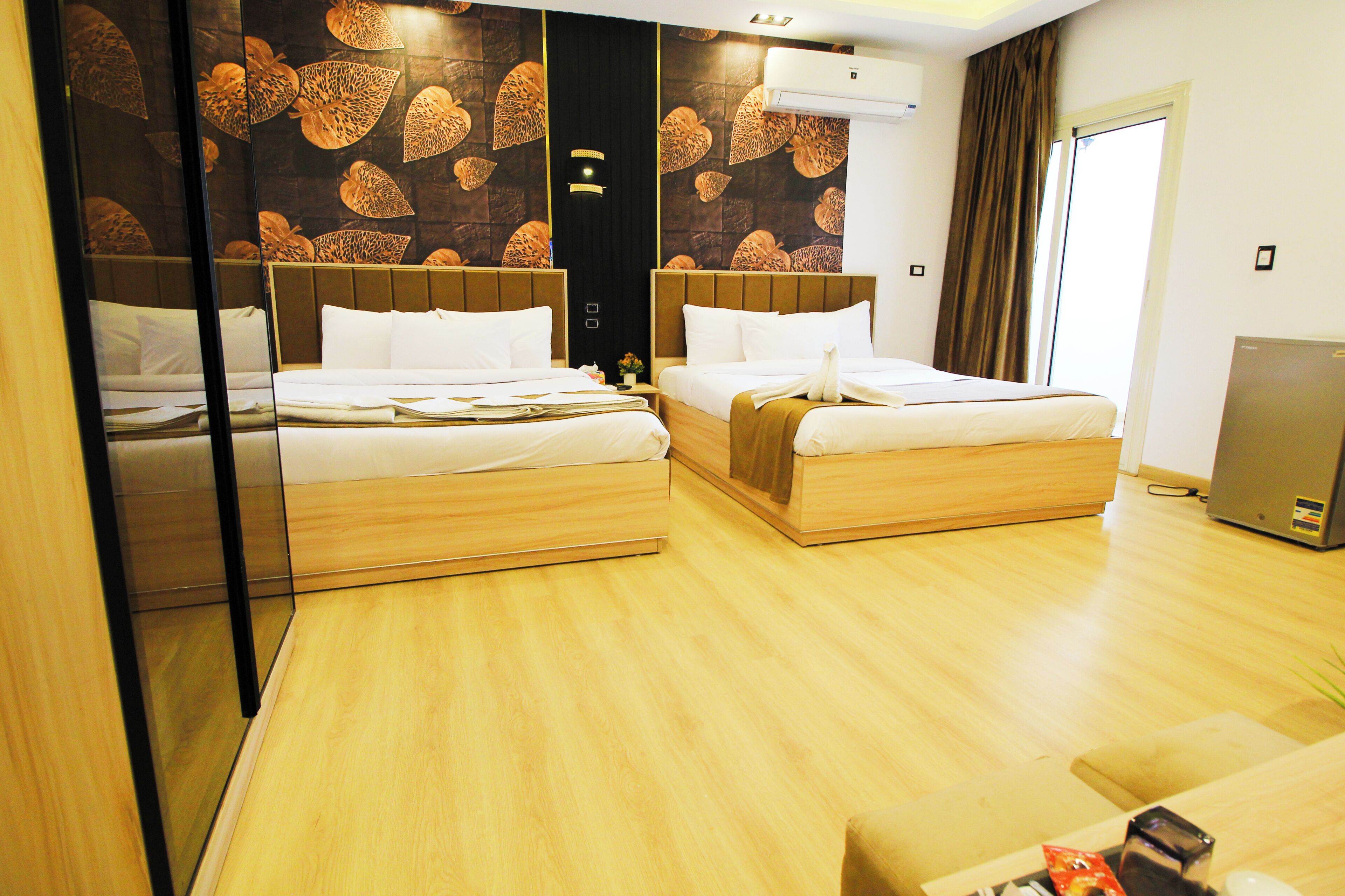 Deluxe Quadruple Room, Balcony, Garden View | Egyptian cotton sheets, premium bedding, minibar, in-room safe