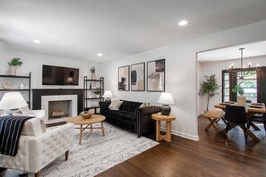 TV, fireplace, books, offices