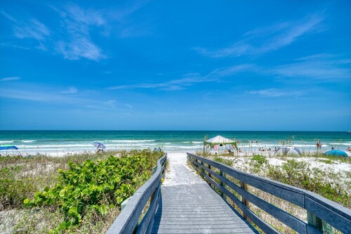 Coastal Elegance: Retreat with Heated Pool, Golf Cart, and Entertainment Haven