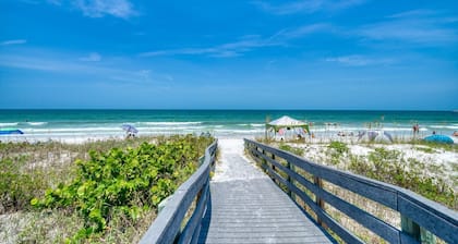 Coastal Elegance: Retreat with Heated Pool, Golf Cart, and Entertainment Haven