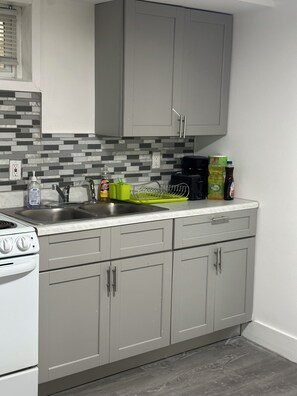 Een magnetron, een oven, een kookplaat