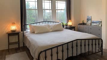 Suite, Ground Floor | 1 bedroom, iron/ironing board, free WiFi, bed sheets