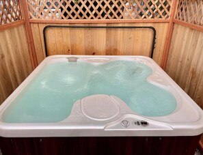 Outdoor spa tub - A Moment In-Time Cottage (De Beque)