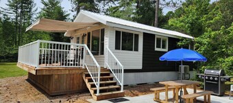 COZY CABIN IN THE WOODS FOR 2. SPACIOUS WELL APPOINTED. NEW LISTING!