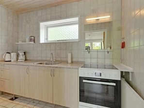 Fridge, oven, highchair, cookware/dishes/utensils