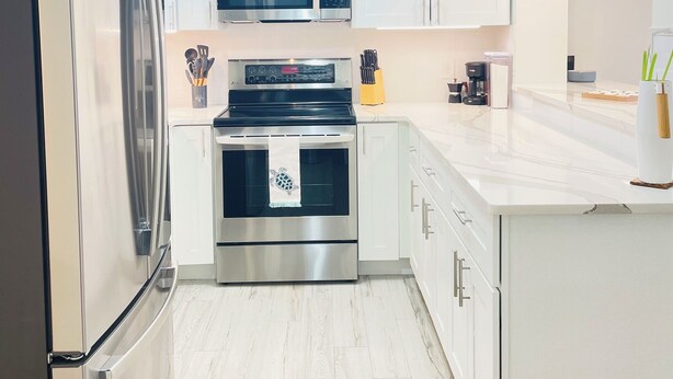 Coffee/tea maker, fridge, microwave, oven
