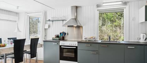 Fridge, oven, high chair, cookware/dishes/utensils