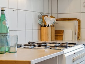 Fridge, microwave, oven, cookware/dishes/utensils