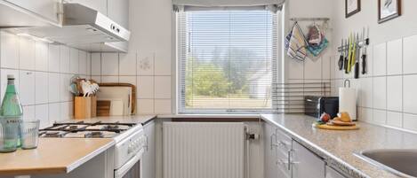 Fridge, microwave, oven, cookware/dishes/utensils