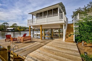 Private dock, boat slip, fish cleaning station, and your own two-story screened boathouse!  This is the waterfront compound that made you book it. - Fish River Retreat, Private Dock & Boathouse Bar (Summerdale)