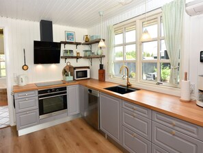 Fridge, microwave, dishwasher, cookware/dishes/utensils