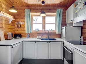 Fridge, oven, cookware/dishes/utensils