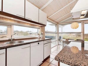 Fridge, microwave, dishwasher, cookware/dishes/utensils