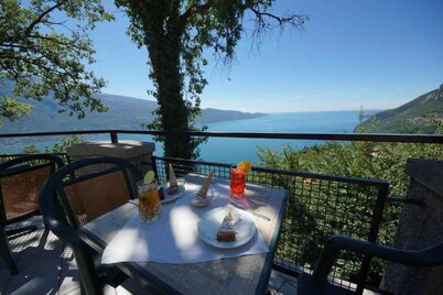 Holiday apartment with lake view and pool