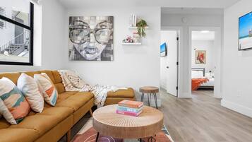 Deluxe Apartment | Living area | 50-inch Smart TV with digital channels, Netflix, Hulu