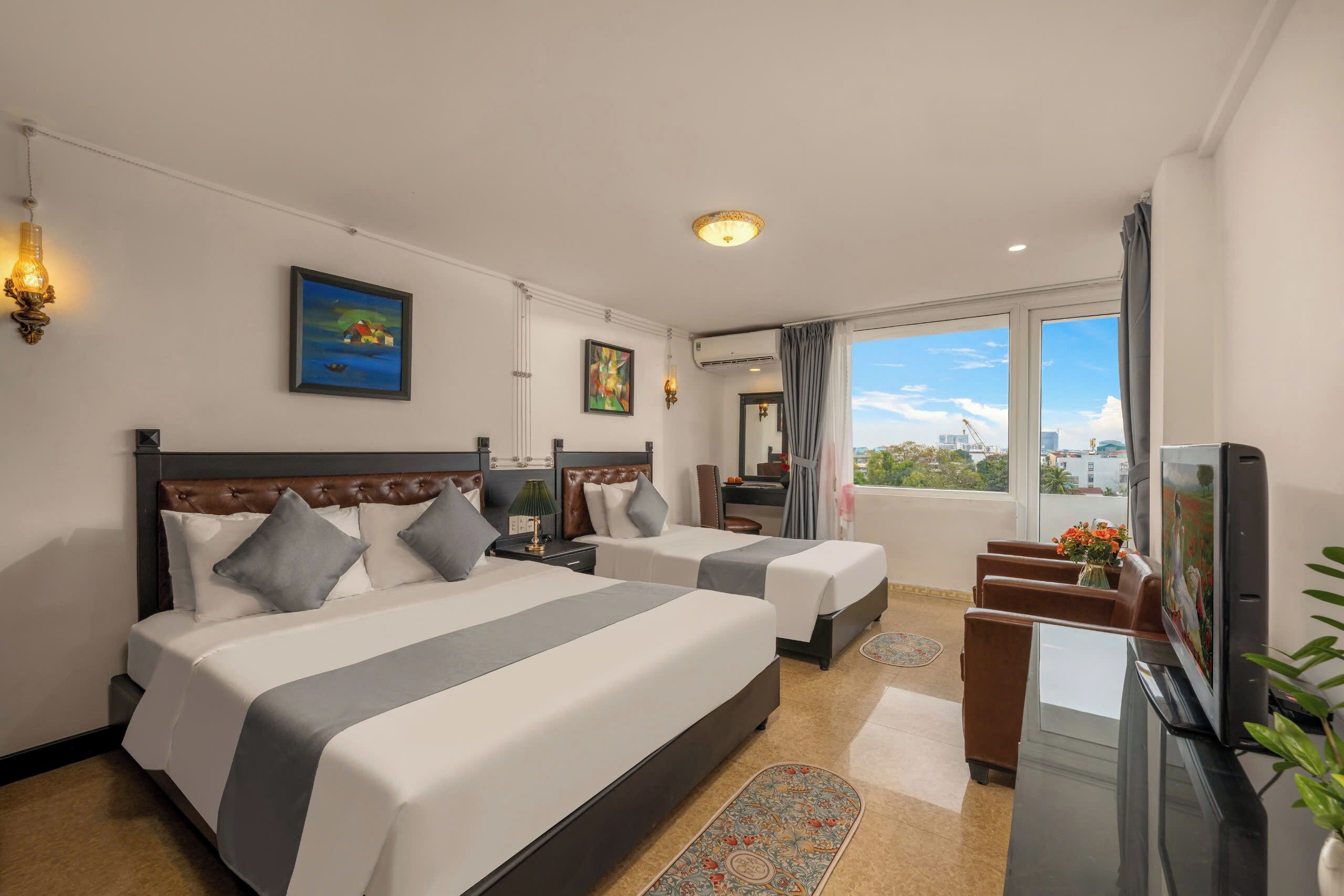 Panoramic Triple Room | Minibar, in-room safe, desk, laptop workspace