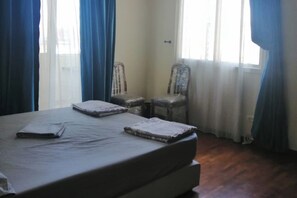 2 habitaciones, tabla de planchar con plancha, wifi y ropa de cama 