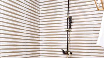 Combined shower/tub, rainfall showerhead, hair dryer, bathrobes