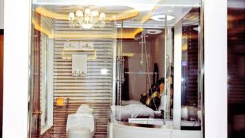 Combined shower/tub, rainfall showerhead, hair dryer, bathrobes