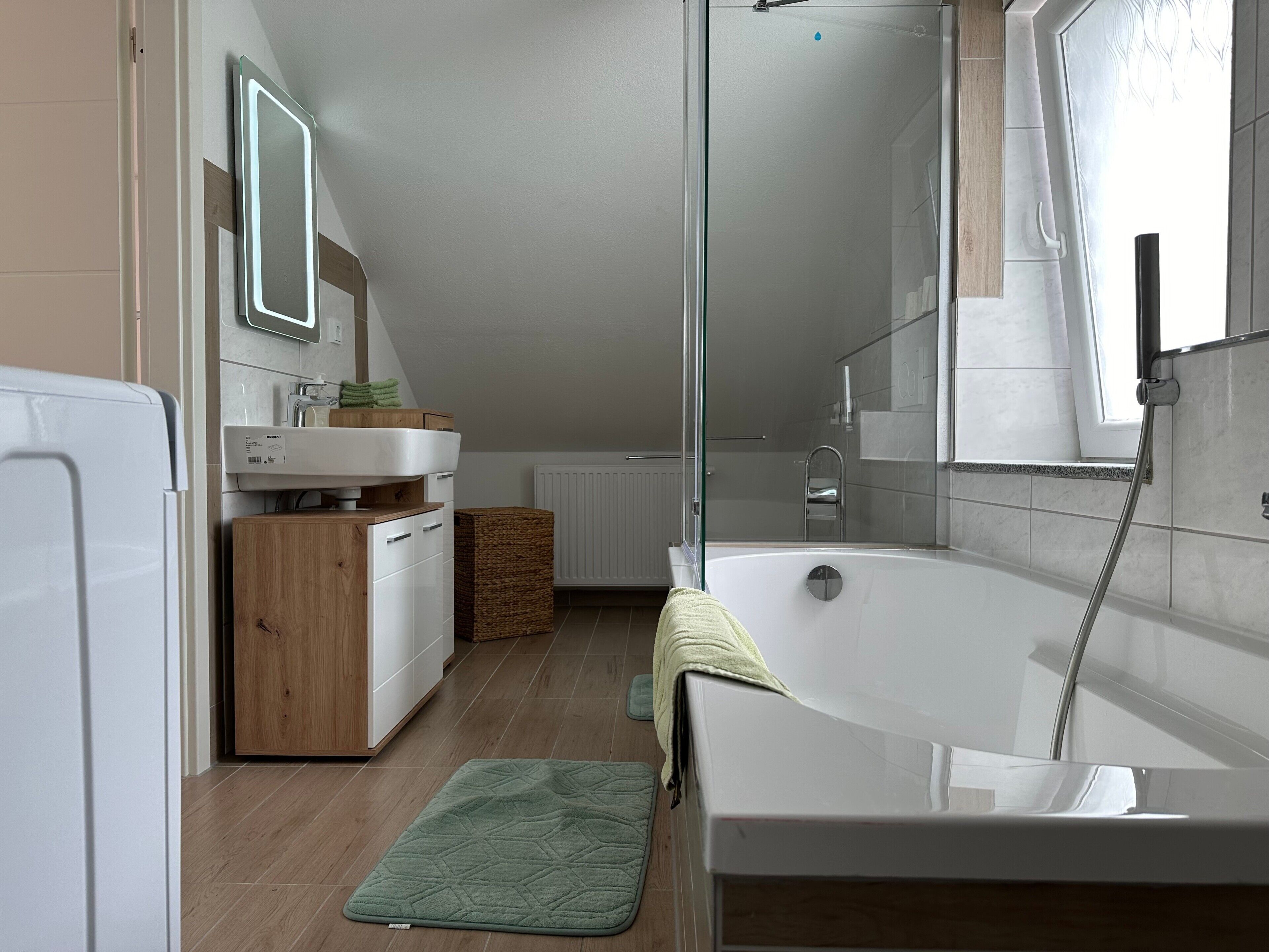 Bathtub, hair dryer, towels