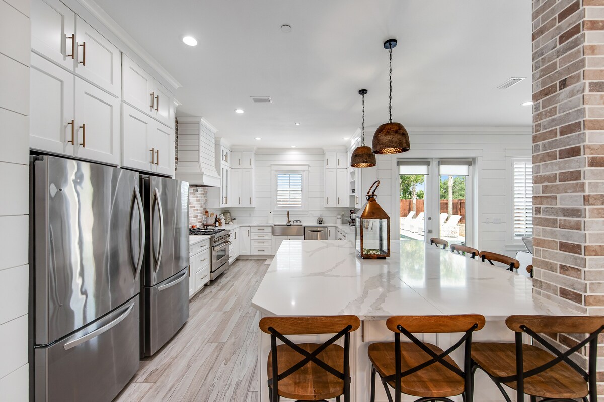 Photo 12 of Incredible three-story home with a pool, pool spa, wet bars, AC, & washer/dryer