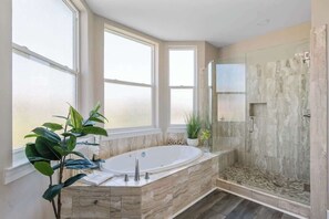 Shower, hair dryer, towels, shampoo