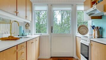 Fridge, microwave, cookware/dishes/utensils