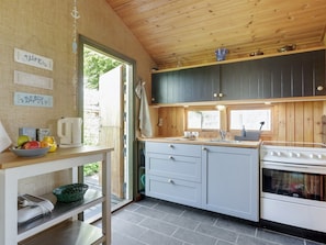 Fridge, oven, high chair, cookware/dishes/utensils
