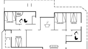Un plano de planta que muestra una cocina, comedor y sala de estar.