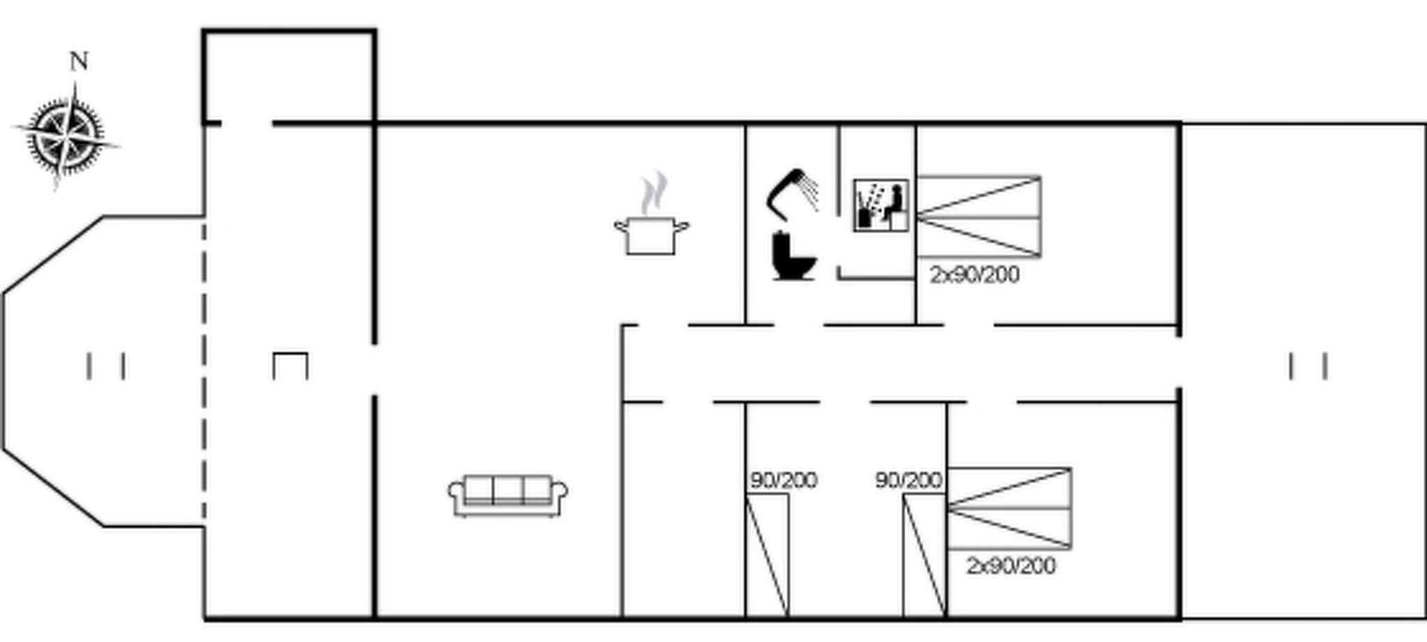 Ein Grundriss mit einer K üche, einem Badezimmer, einem Wohnbereich und einem Essbereich.