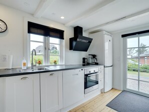 Fridge, microwave, dishwasher, cookware/dishes/utensils