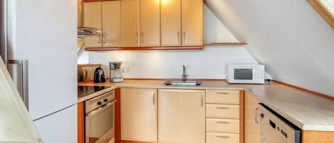 Fridge, microwave, cookware/dishes/utensils