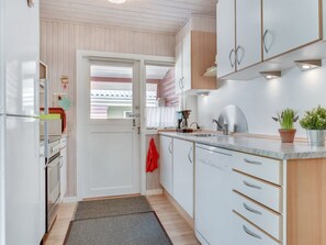Fridge, microwave, dishwasher, cookware/dishes/utensils
