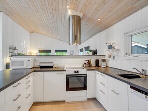 Fridge, microwave, dishwasher, cookware/dishes/utensils