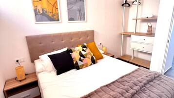 2 dormitorios, tabla de planchar con plancha, wifi gratis y ropa de cama