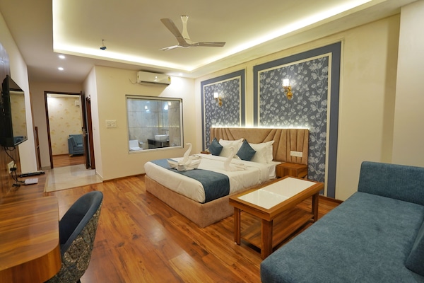 Suite ejecutiva | 1 dormitorio, tabla de planchar con plancha, wifi gratis